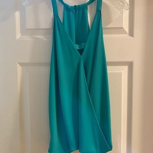 Blue flow top size large but fits small